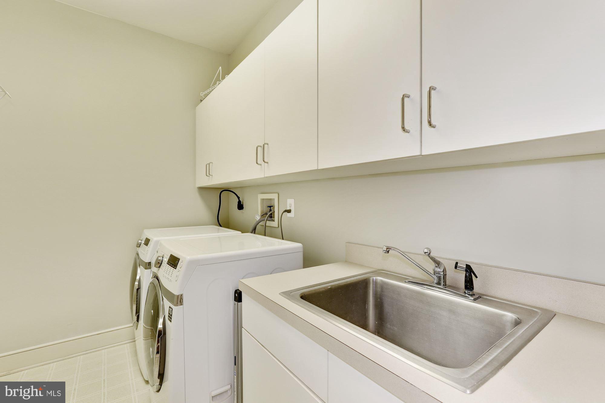 3617 Black Walnut Lane Glenwood, MD 21738 - Photo 48 of 83 Main Level Laundry, Cabinetry & Utility Sink