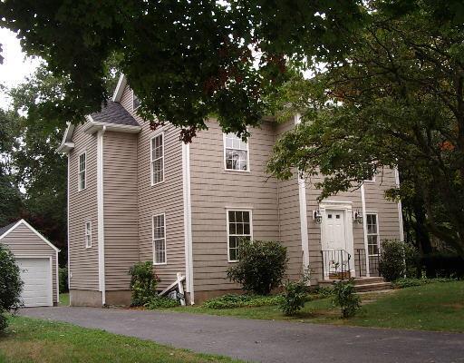 56 Dunnlea Road Fairfield, CT 06824 - Photo 1 of 1 front view of a house with a yard