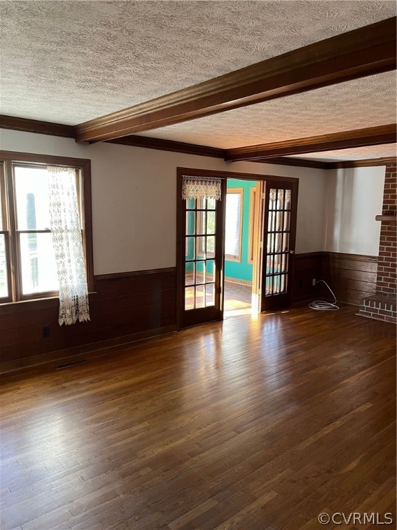 14110 Helmsley Road Midlothian, VA 23113 - Photo 4 of 6 an empty room with wooden floor and windows