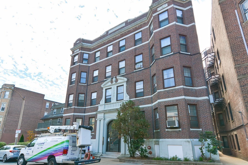 22 Orkney Road, Unit 5 Boston, MA 02135 - Photo 2 of 42 a front view of a multi story building