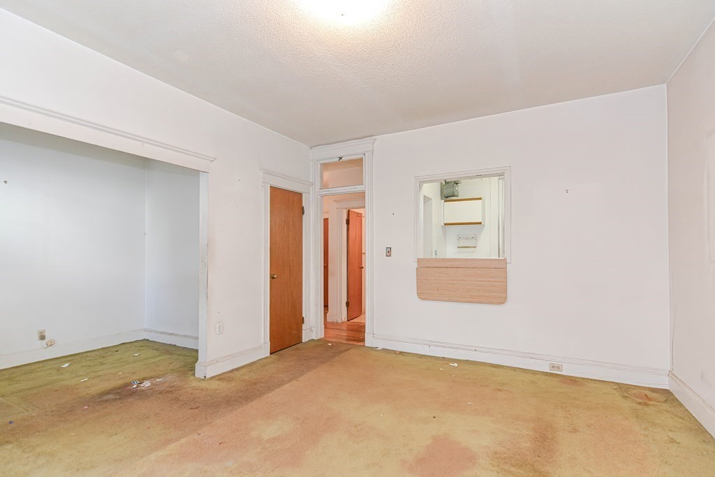 22 Orkney Road, Unit 5 Boston, MA 02135 - Photo 22 of 42 a view of an empty room with a window