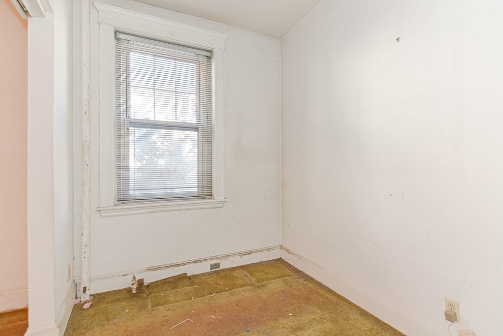 22 Orkney Road, Unit 5 Boston, MA 02135 - Photo 26 of 42 an empty room with a window