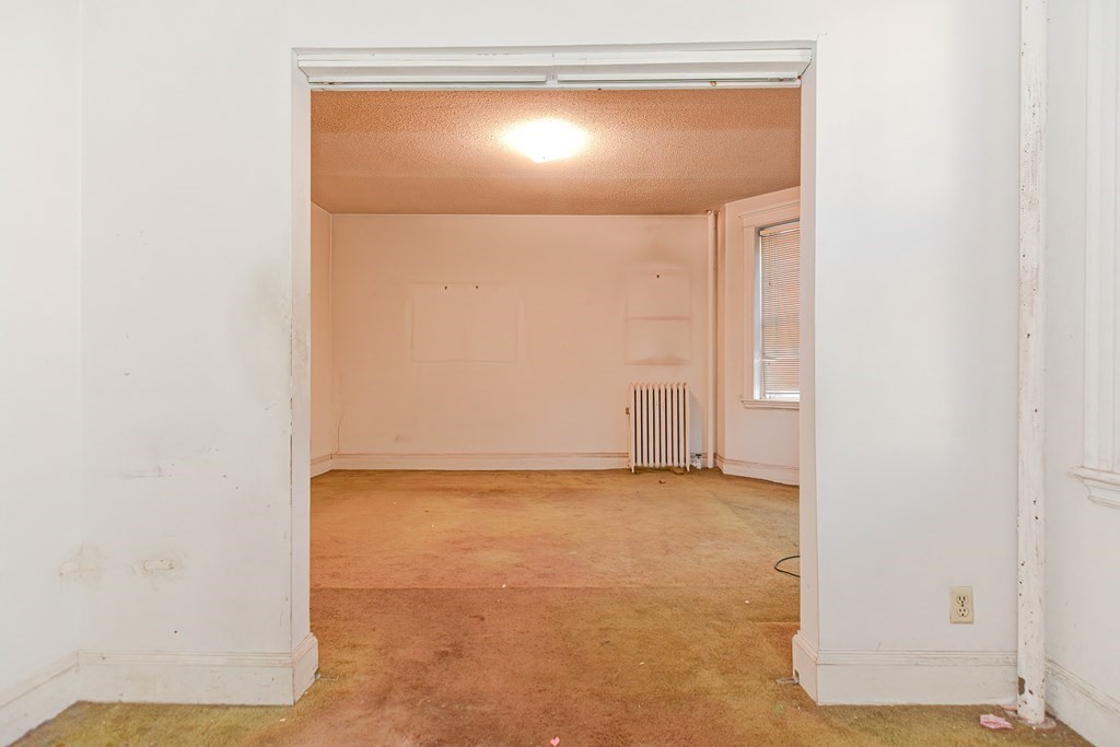 22 Orkney Road, Unit 5 Boston, MA 02135 - Photo 33 of 42 a view of a room with a door