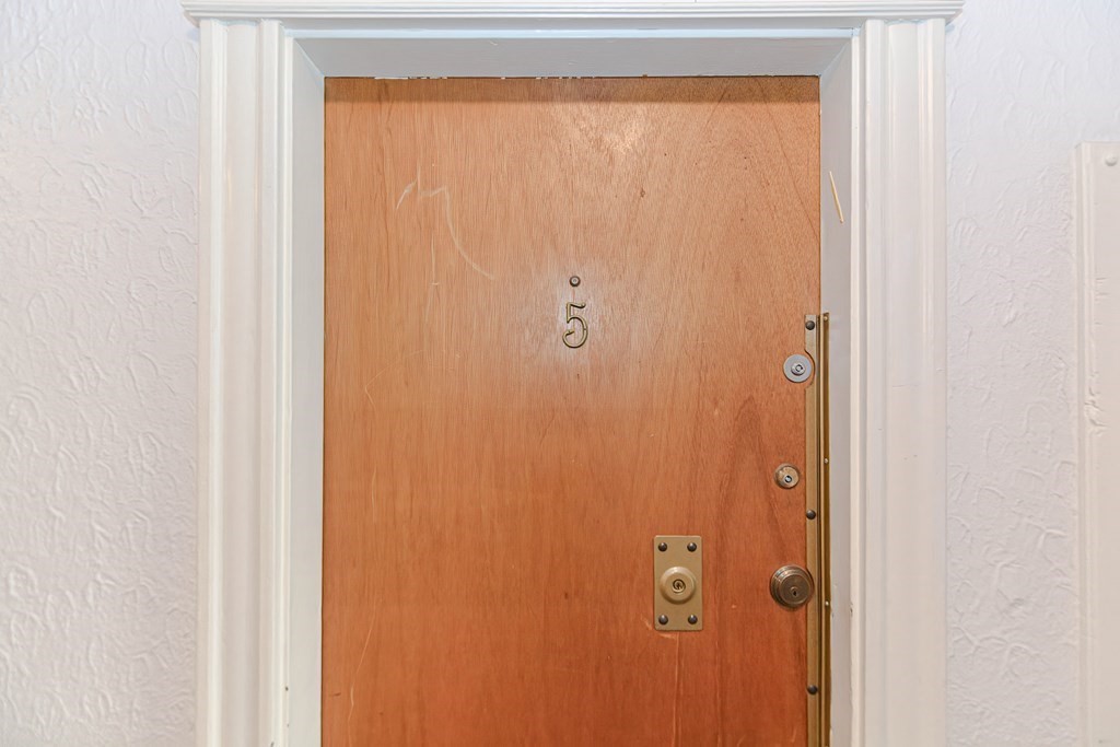 22 Orkney Road, Unit 5 Boston, MA 02135 - Photo 36 of 42 a bathroom with a glass shower door