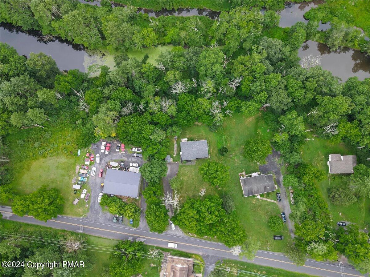 6051 Neola Road Stroudsburg, PA 18360 - Photo 56 of 57 an aerial view of residential house with outdoor space and trees all around