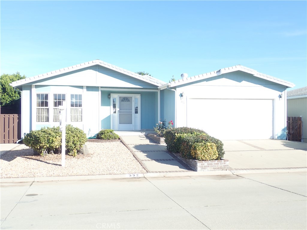 27250 Murrieta Road, Unit 332 Menifee, CA 92586 - Photo 1 of 26 a front view of a house with a yard