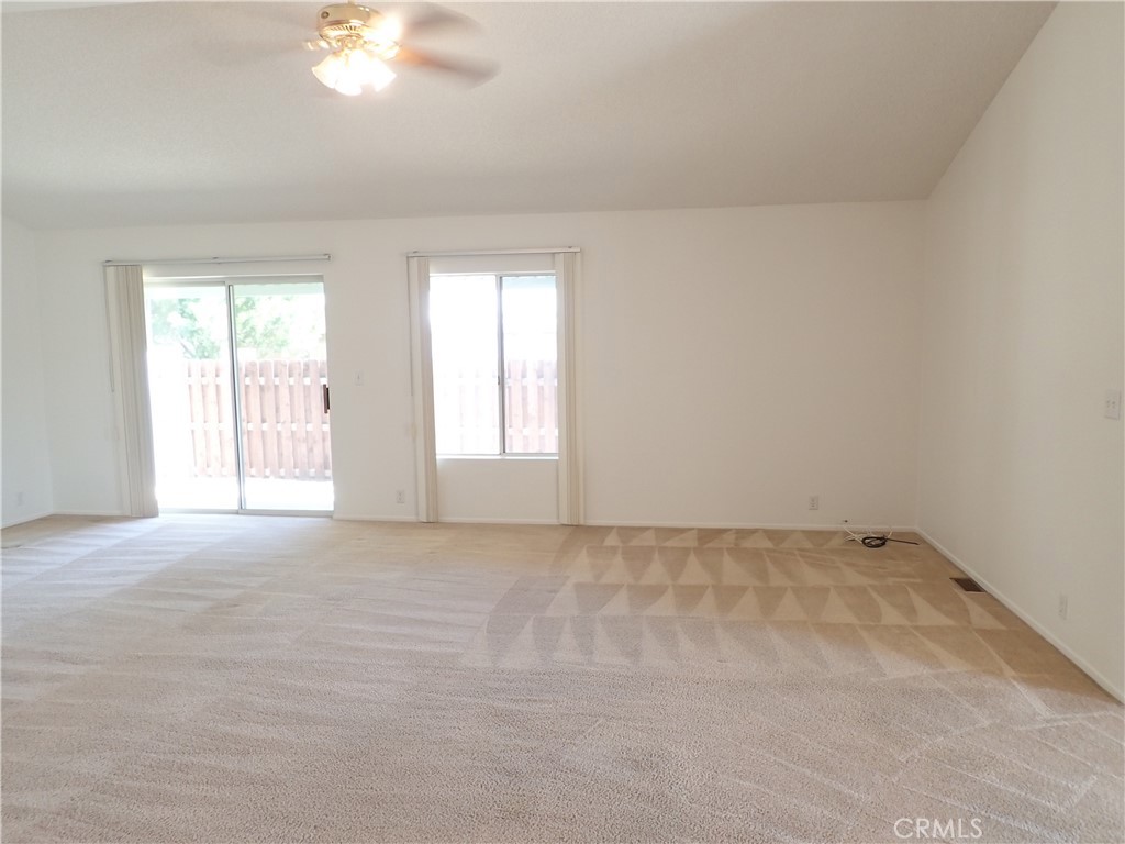27250 Murrieta Road, Unit 332 Menifee, CA 92586 - Photo 12 of 26 a view of an empty room with a window