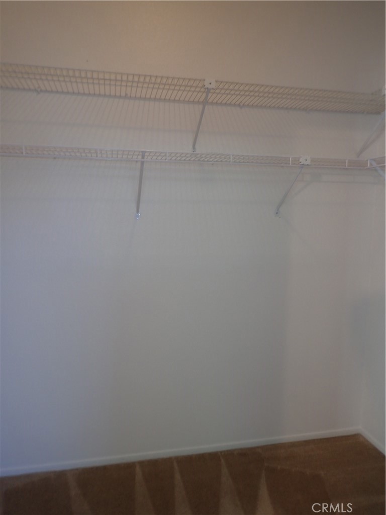 27250 Murrieta Road, Unit 332 Menifee, CA 92586 - Photo 20 of 26 a view of small space with racks on the wall