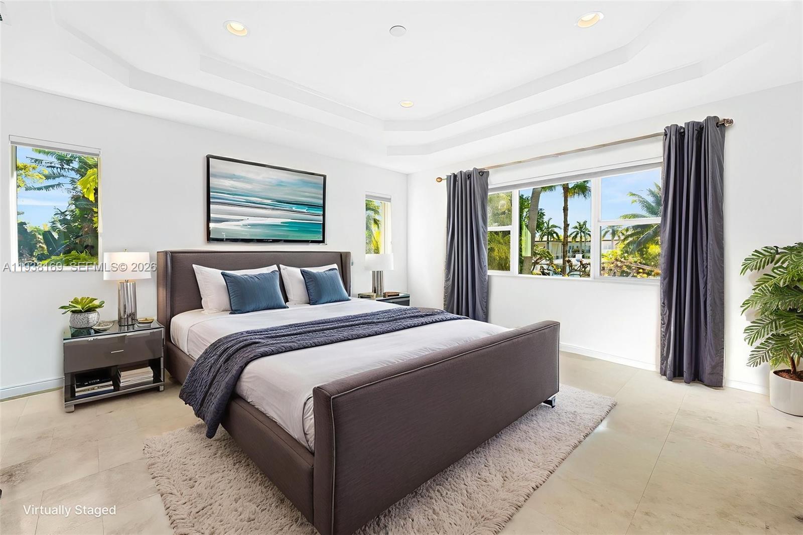 1490 Cleveland Road Miami Beach, FL 33141 - Photo 13 of 38 a bedroom with bed and window