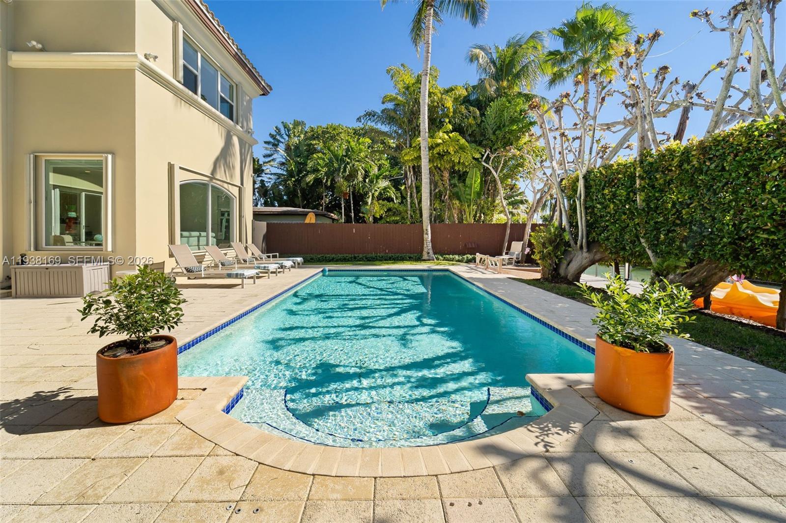 1490 Cleveland Road Miami Beach, FL 33141 - Photo 29 of 38 a view of a porch with a fountain