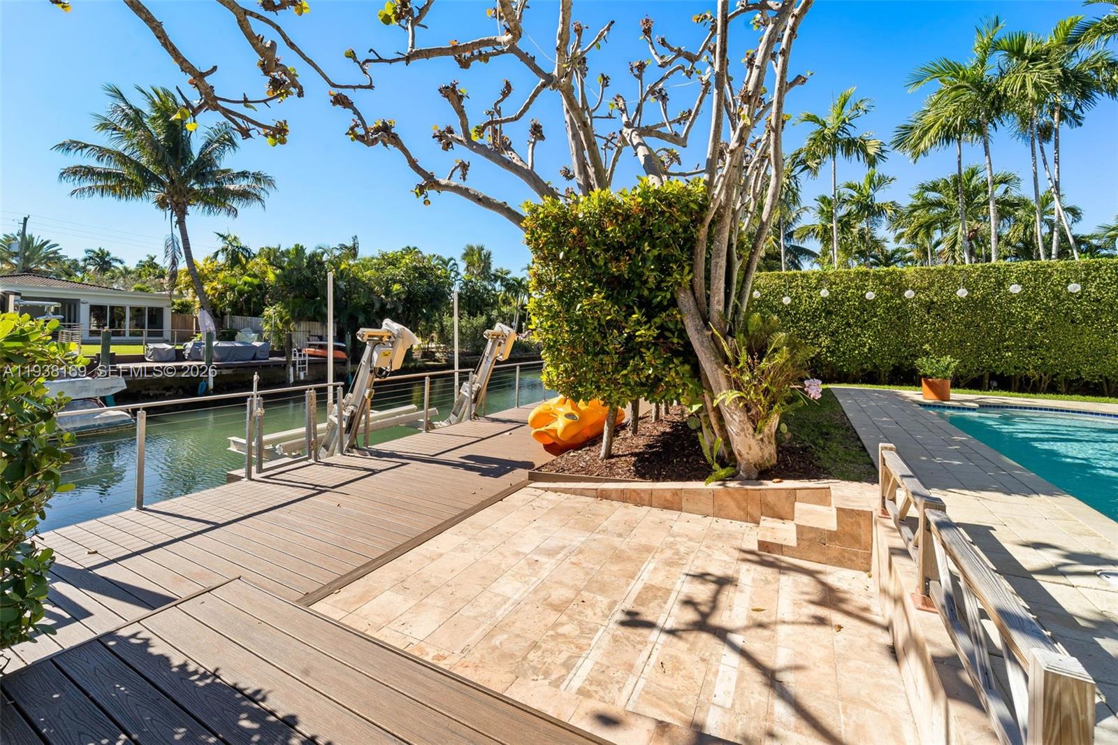 1490 Cleveland Road Miami Beach, FL 33141 - Photo 31 of 38 a view of a lake with a table and chairs