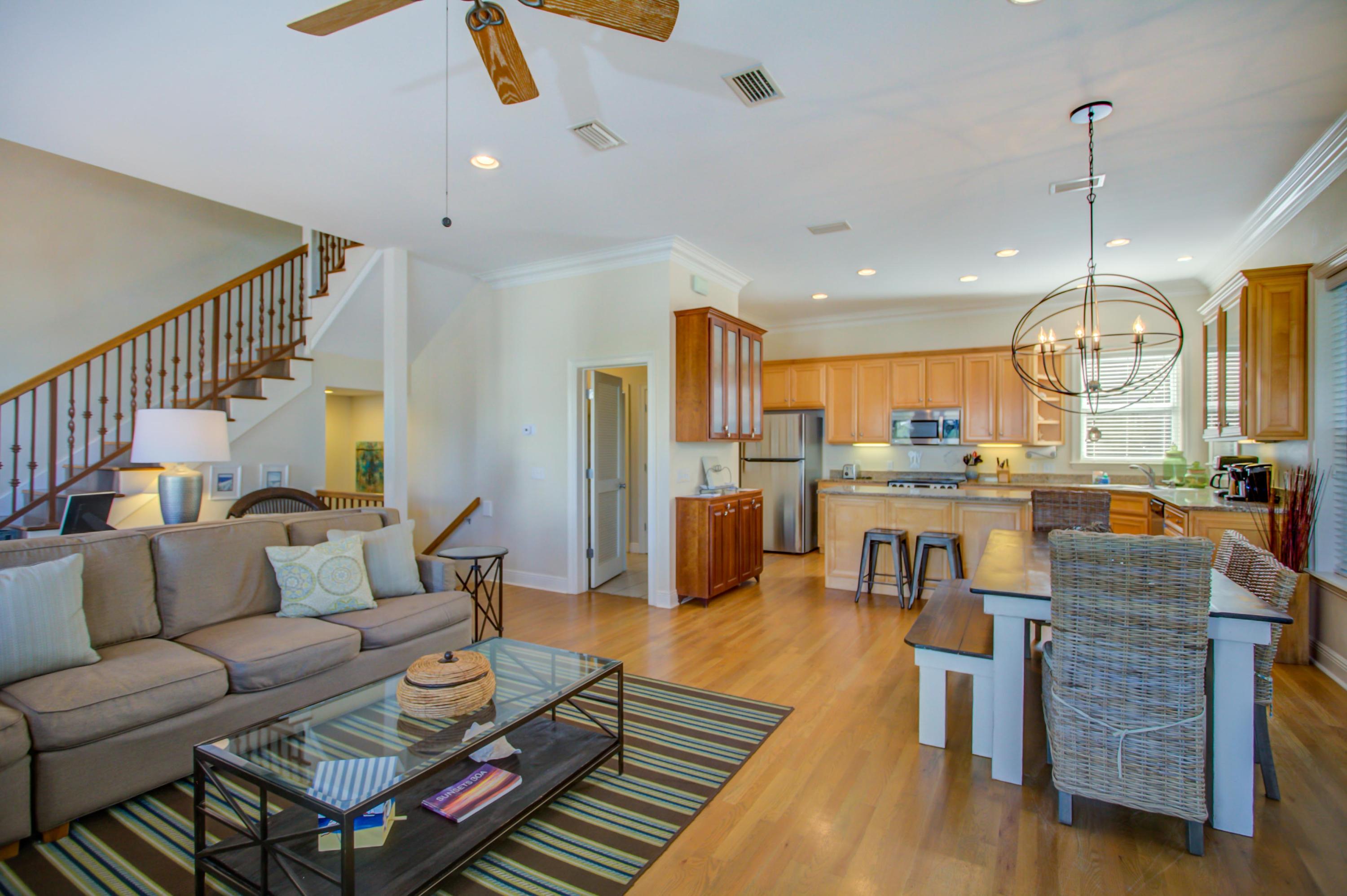 32 Hickory Street Santa Rosa Beach, FL 32459 - Photo 18 of 43 a living room with furniture kitchen view and a wooden floor