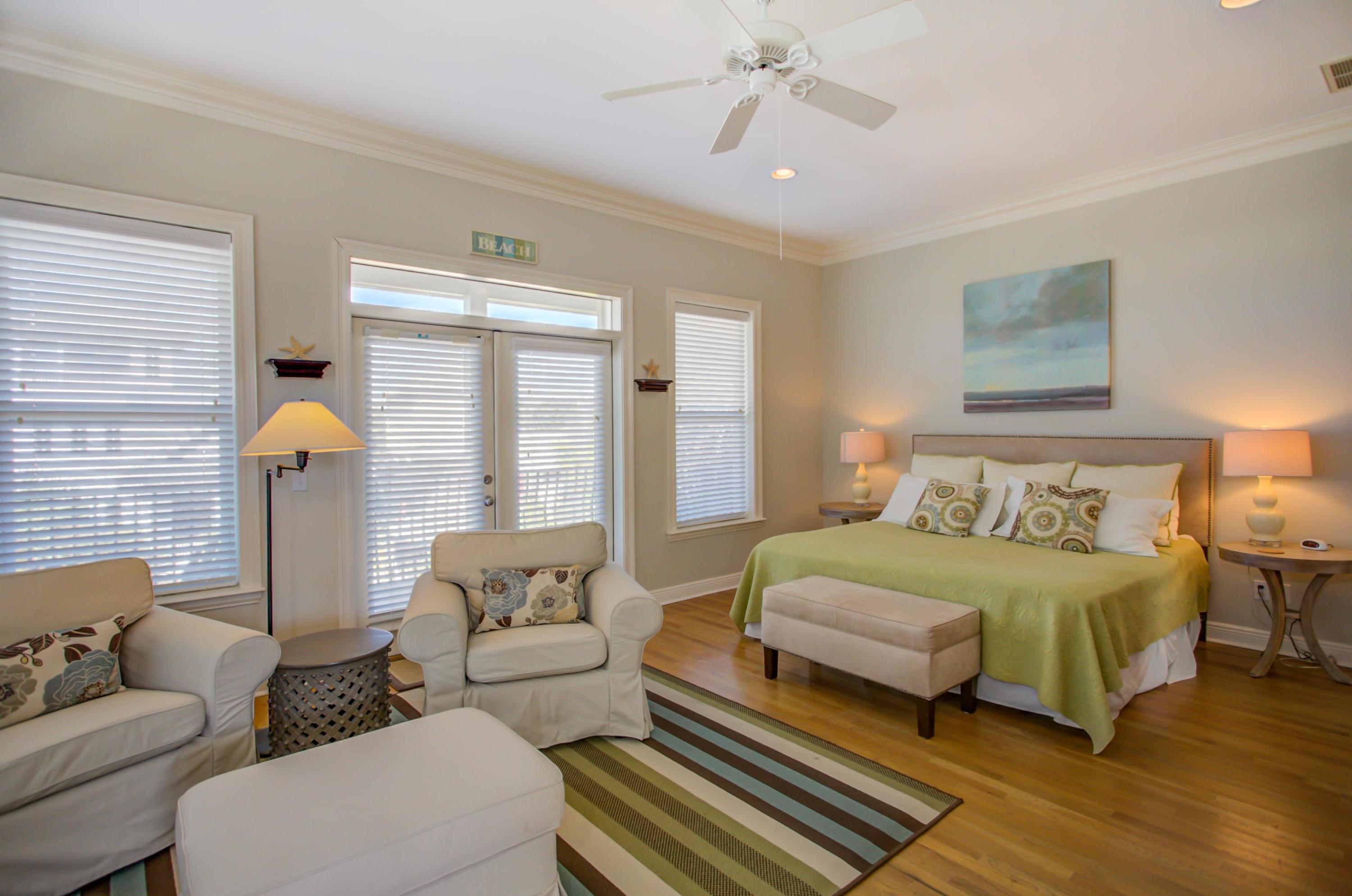 32 Hickory Street Santa Rosa Beach, FL 32459 - Photo 20 of 43 a spacious bedroom with a bed and a couch