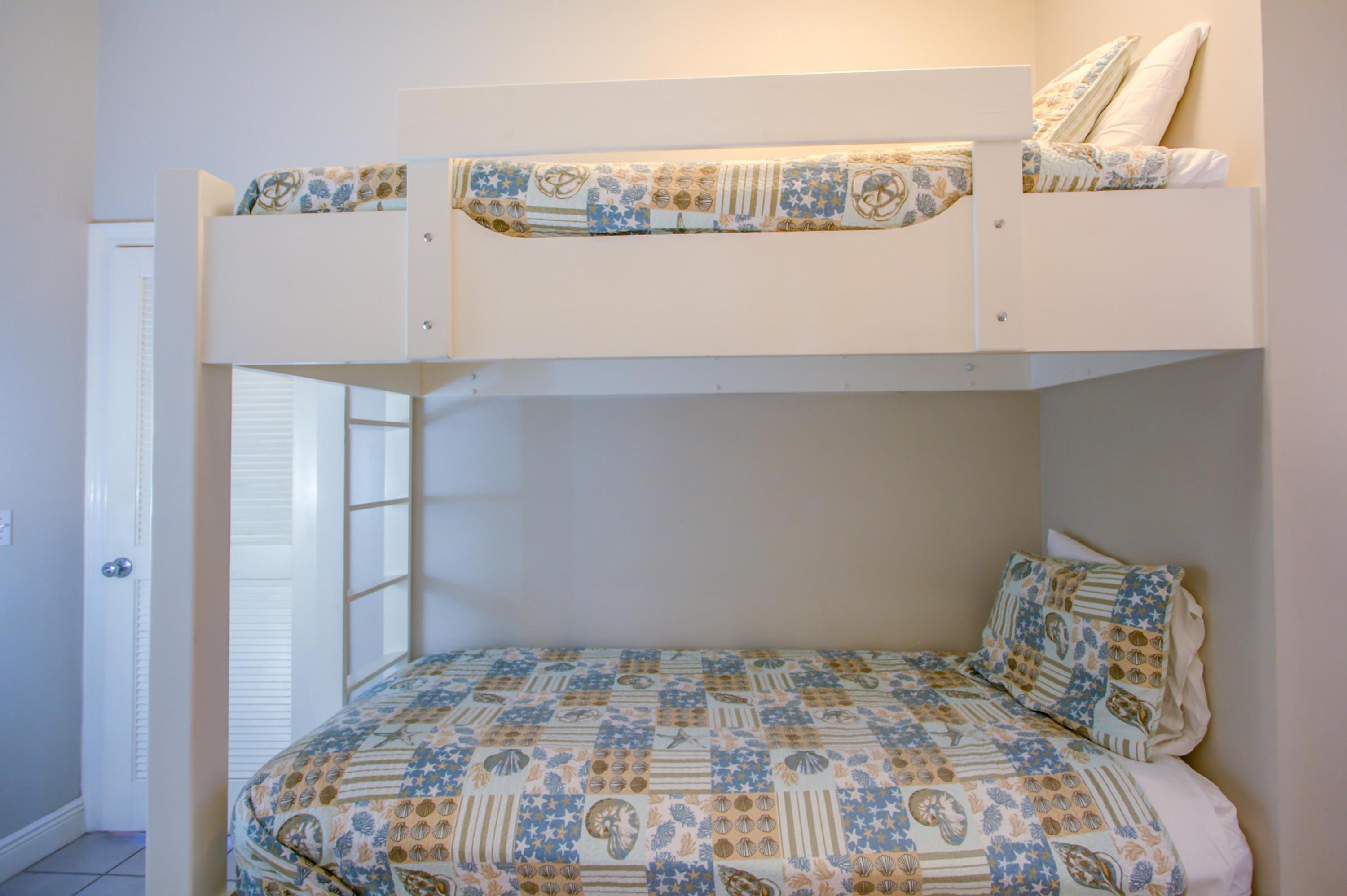 32 Hickory Street Santa Rosa Beach, FL 32459 - Photo 28 of 43 a bedroom with a bed and cabinets