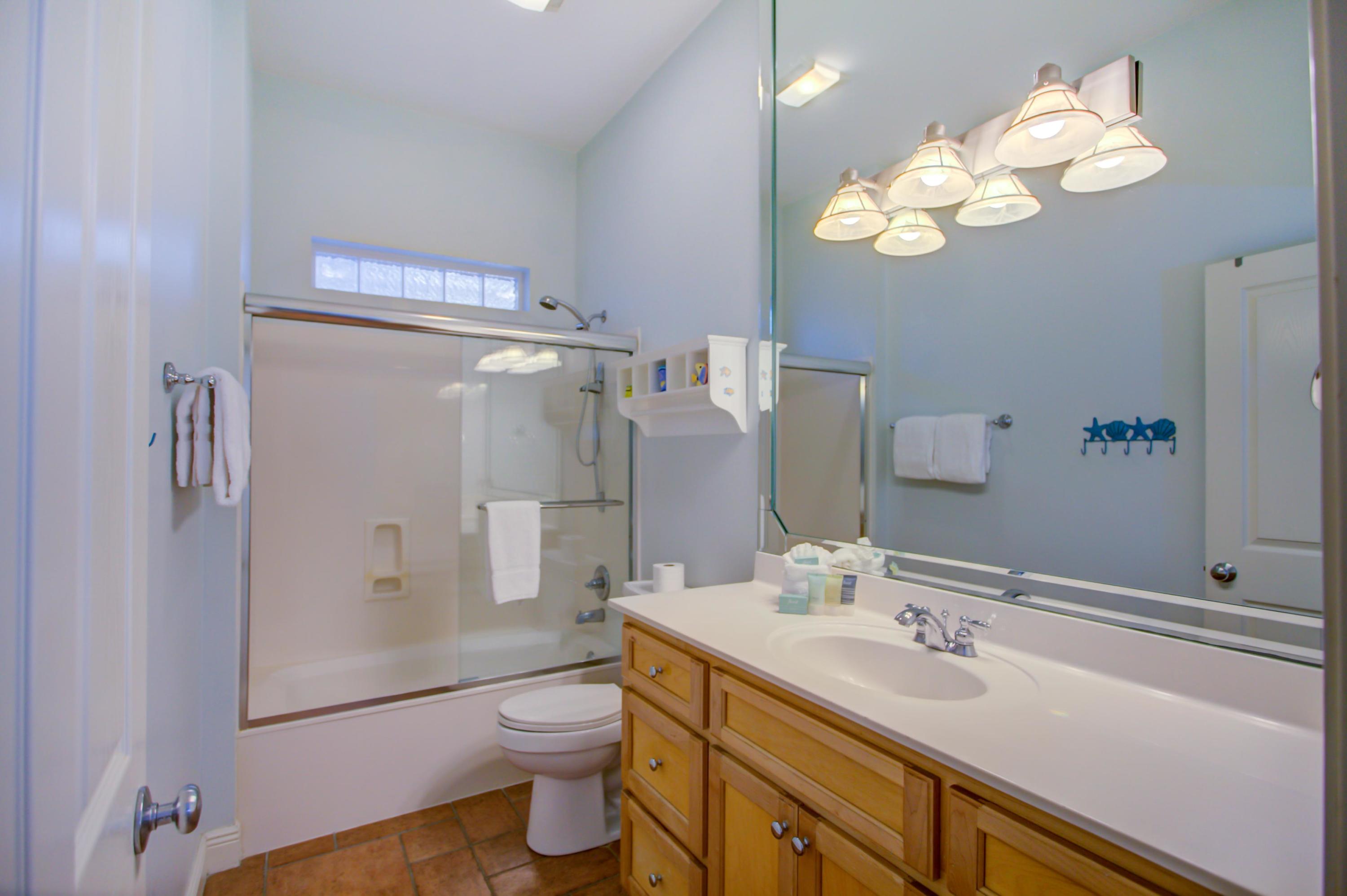 32 Hickory Street Santa Rosa Beach, FL 32459 - Photo 32 of 43 a bathroom with a sink a toilet and shower