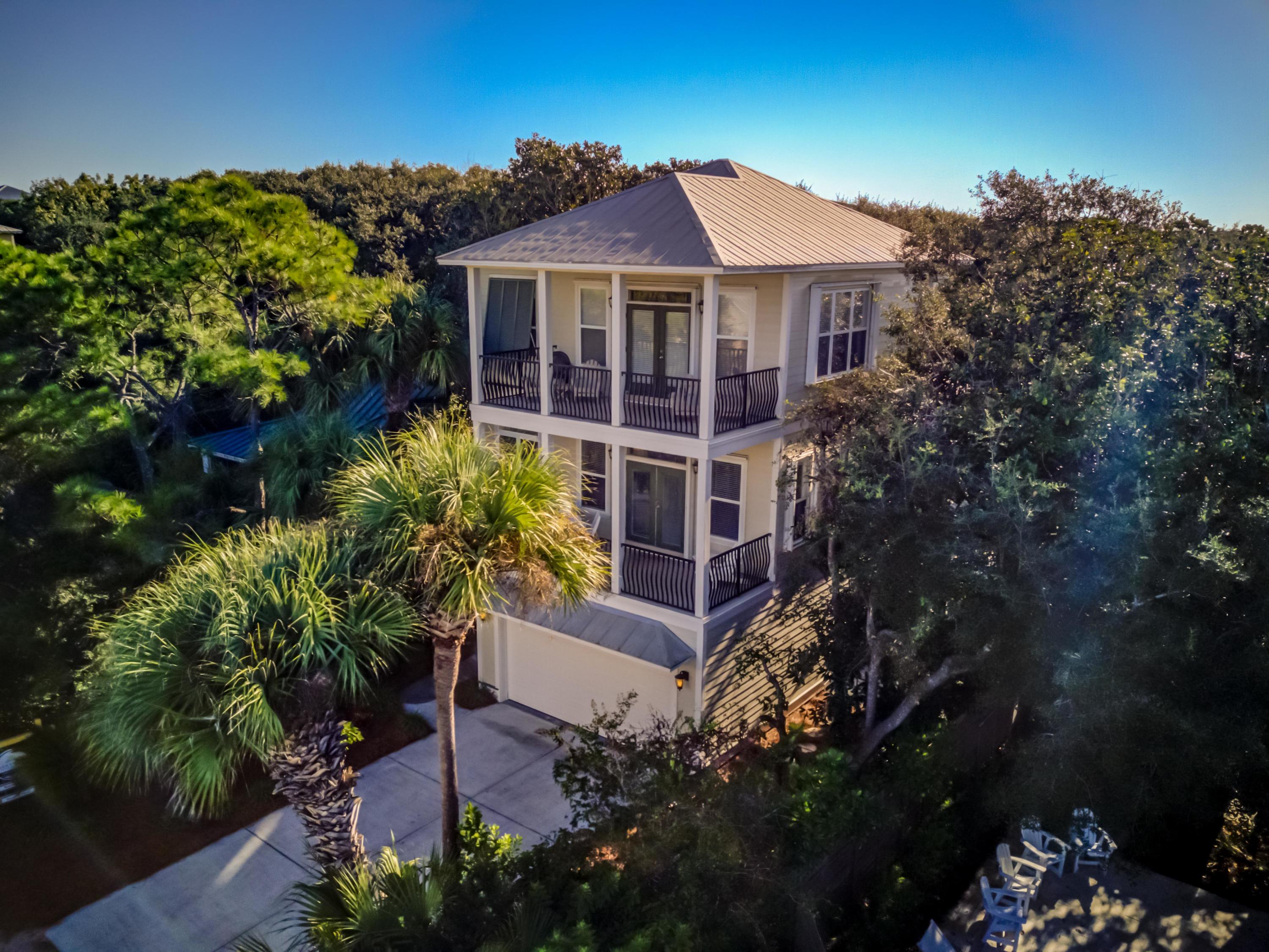 32 Hickory Street Santa Rosa Beach, FL 32459 - Photo 39 of 43 front view of a house with a garden