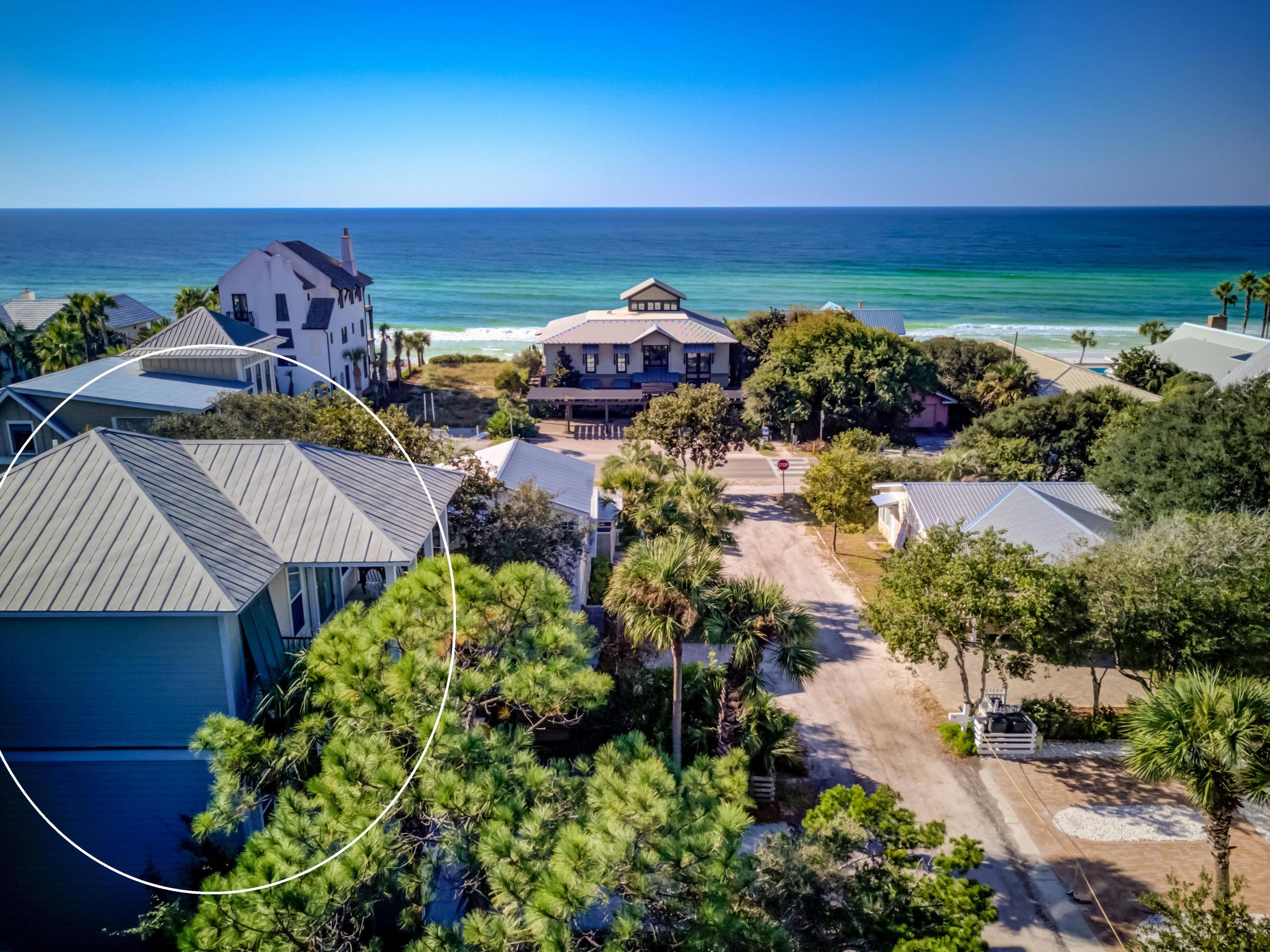 32 Hickory Street Santa Rosa Beach, FL 32459 - Photo 41 of 43 a view of a ocean with a building in the background