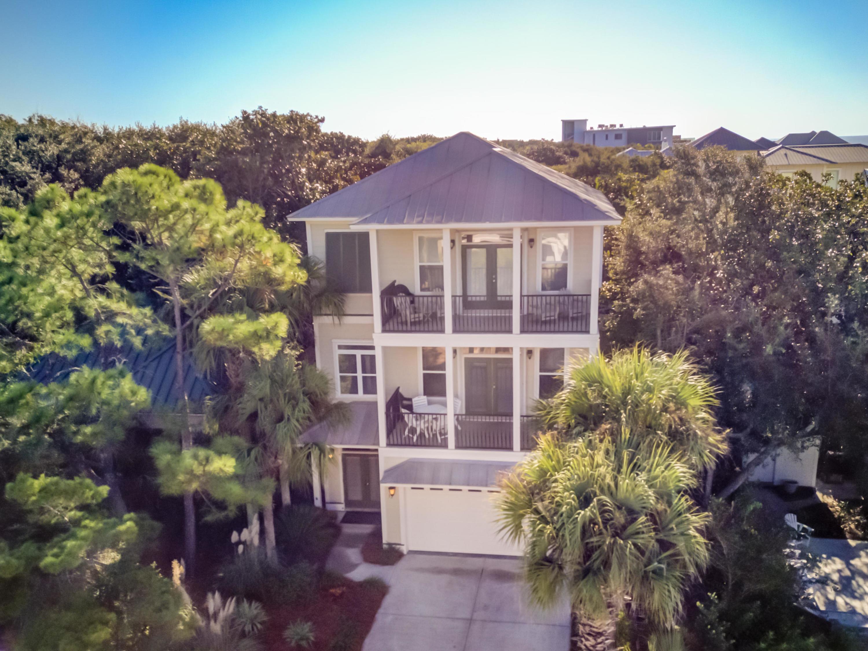 32 Hickory Street Santa Rosa Beach, FL 32459 - Photo 8 of 43 front view of a house with a yard and mountain view