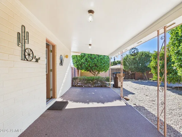 a view of backyard with a deck