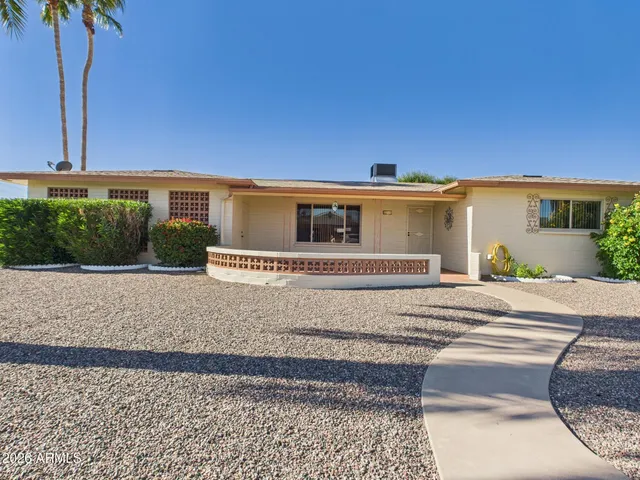 a view of a backyard with plants