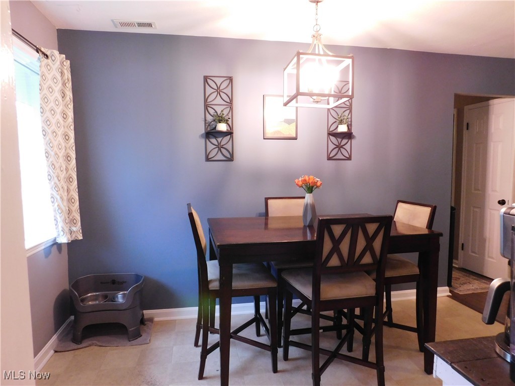 9720 West Ridgewood Drive Parma Heights, OH 44130 - Photo 11 of 46 Dining area new light fixture