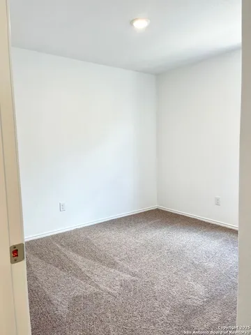 an empty room with a workbench