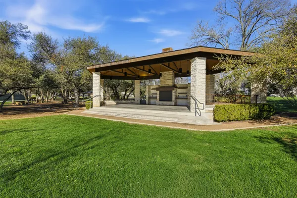 an aerial view of a house with roof deck outdoor seating