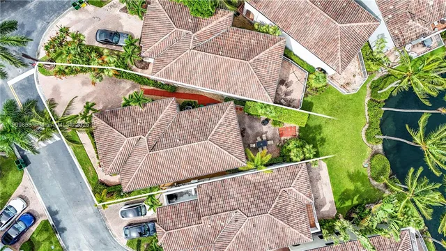 a swimming pool with outdoor seating and yard