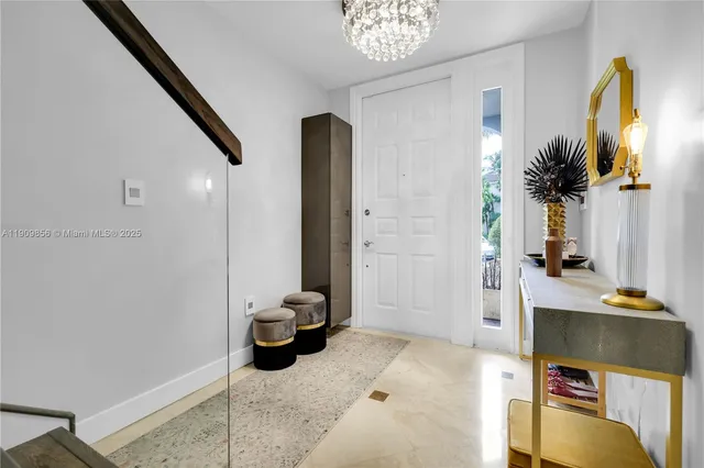 a view of a livingroom with furniture and windows