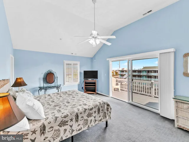 a bathroom with a double vanity sink mirror and shower