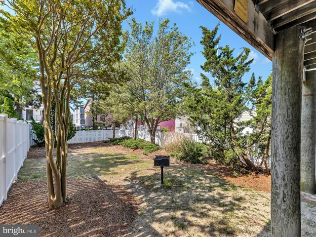 a view of a balcony with wooden floor