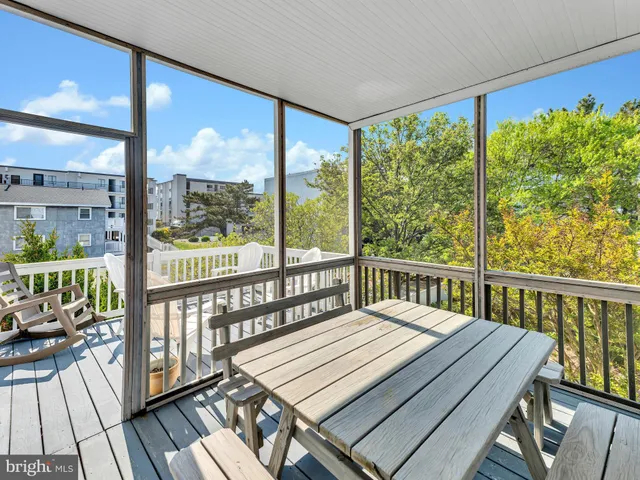 a view of a balcony with an outdoor space