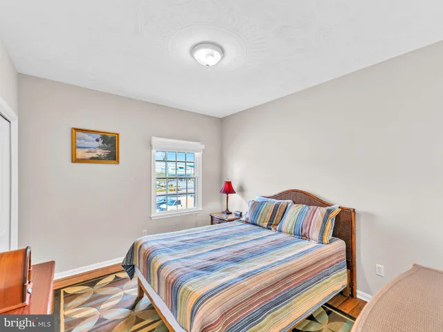 a kitchen that has a lot of cabinets and refrigerator