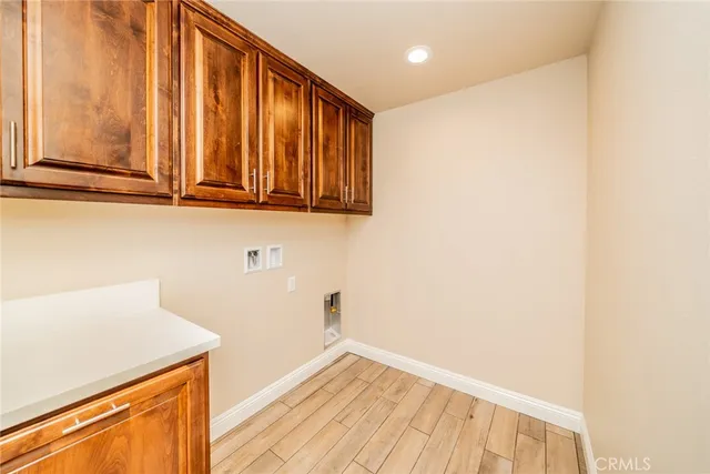 a spacious bathroom with a tub sink and mirror