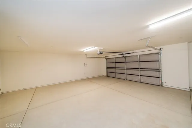 a view of a house with a snow on the background