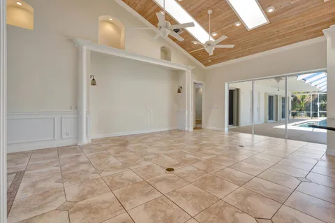 a view of a living room with a large window
