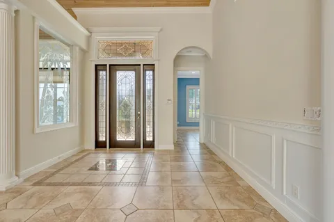a view of an entryway with a glass door