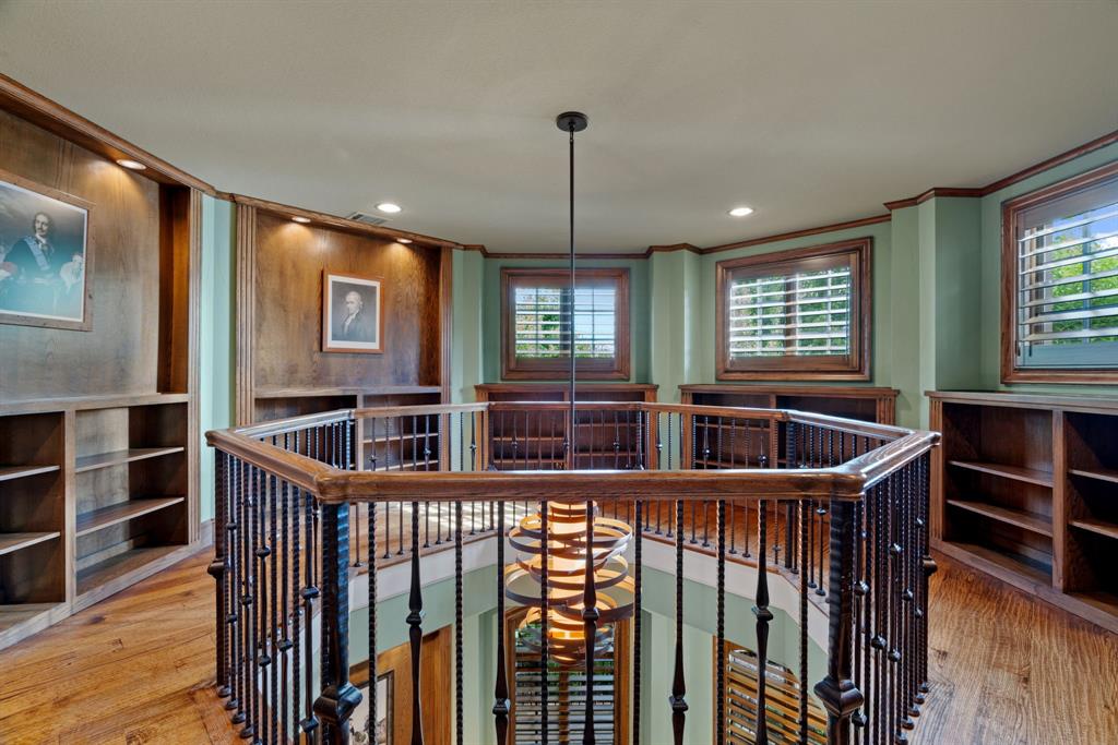 1908 Point De Vue Flower Mound, TX 75022 - Photo 15 of 40 a dining room with wooden floor windows and furniture