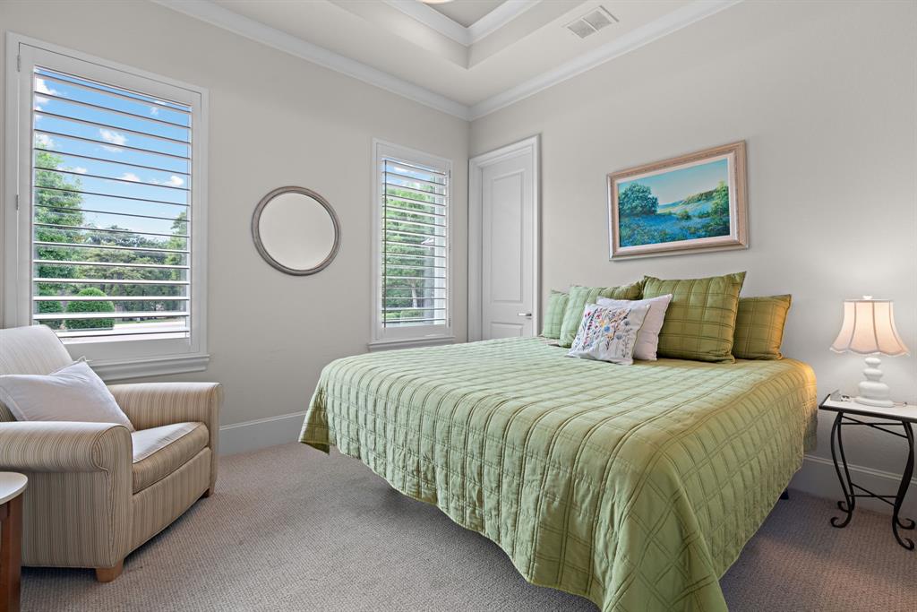 1908 Point De Vue Flower Mound, TX 75022 - Photo 32 of 40 a bedroom with a bed and window