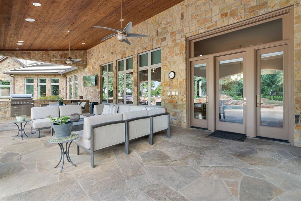 1908 Point De Vue Flower Mound, TX 75022 - Photo 37 of 40 a balcony with furniture and large windows