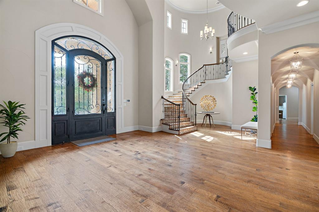 1908 Point De Vue Flower Mound, TX 75022 - Photo 4 of 40 a view of a room with wooden floor windows and entryway