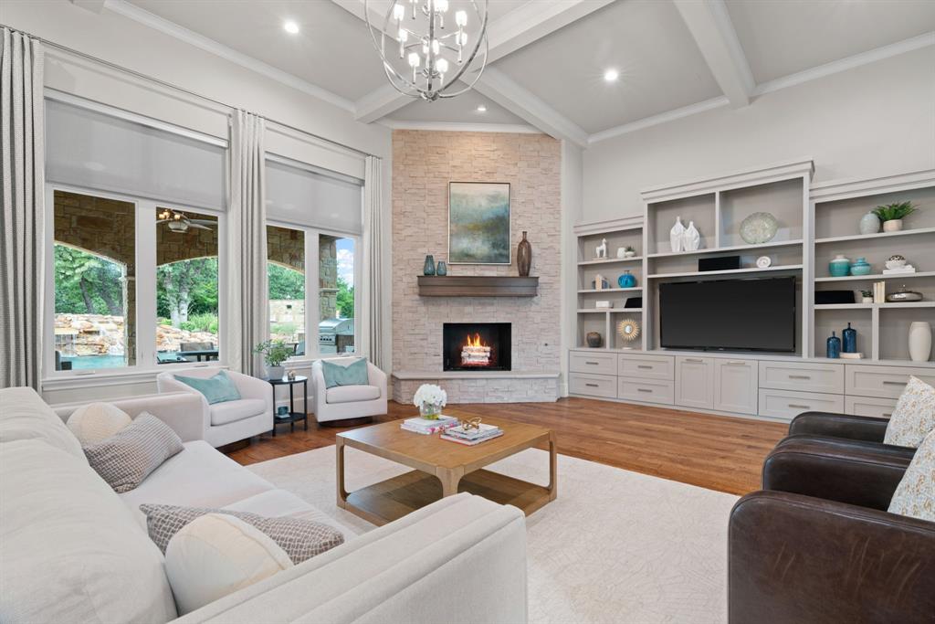 1908 Point De Vue Flower Mound, TX 75022 - Photo 7 of 40 a living room with furniture fireplace and flat screen tv
