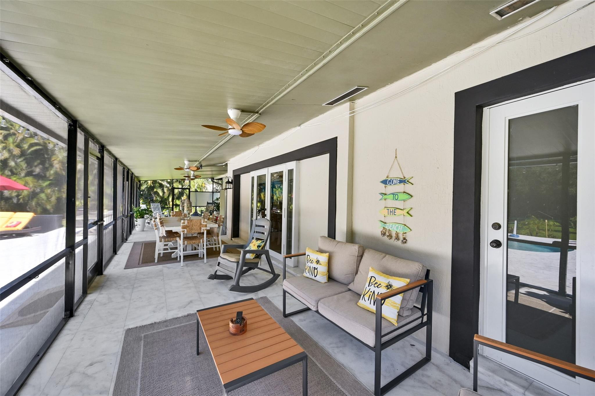 Undisclosed Address Southwest Ranches, FL 33331 - Photo 3 of 24 a living room with furniture and a flat screen tv