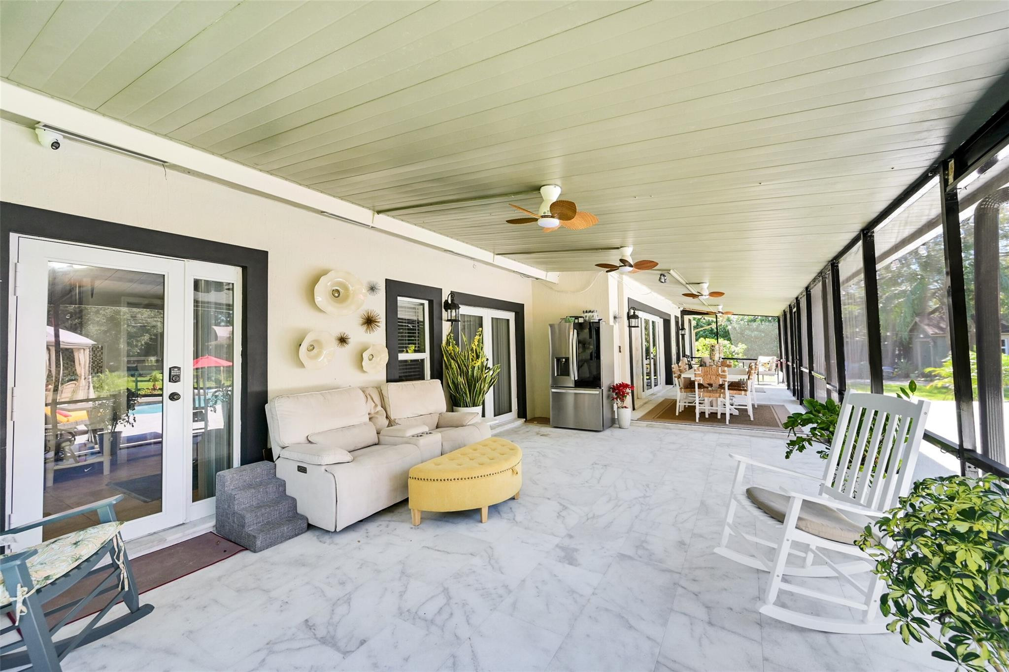 Undisclosed Address Southwest Ranches, FL 33331 - Photo 5 of 24 a view of a livingroom with furniture and floor to ceiling window