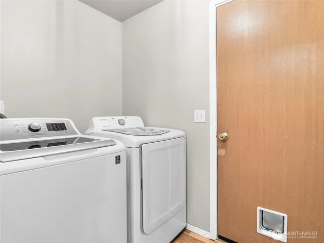 a utility room with dryer and washer