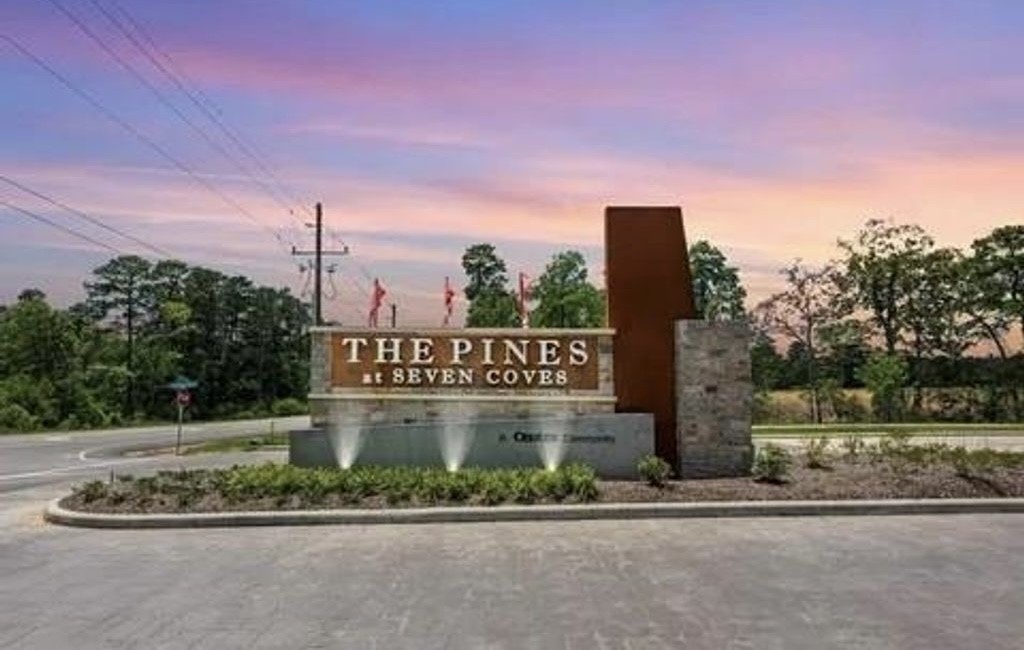 248 Seven Pines Willis, TX 77378 - Photo 11 of 17 a sign board with a small yard