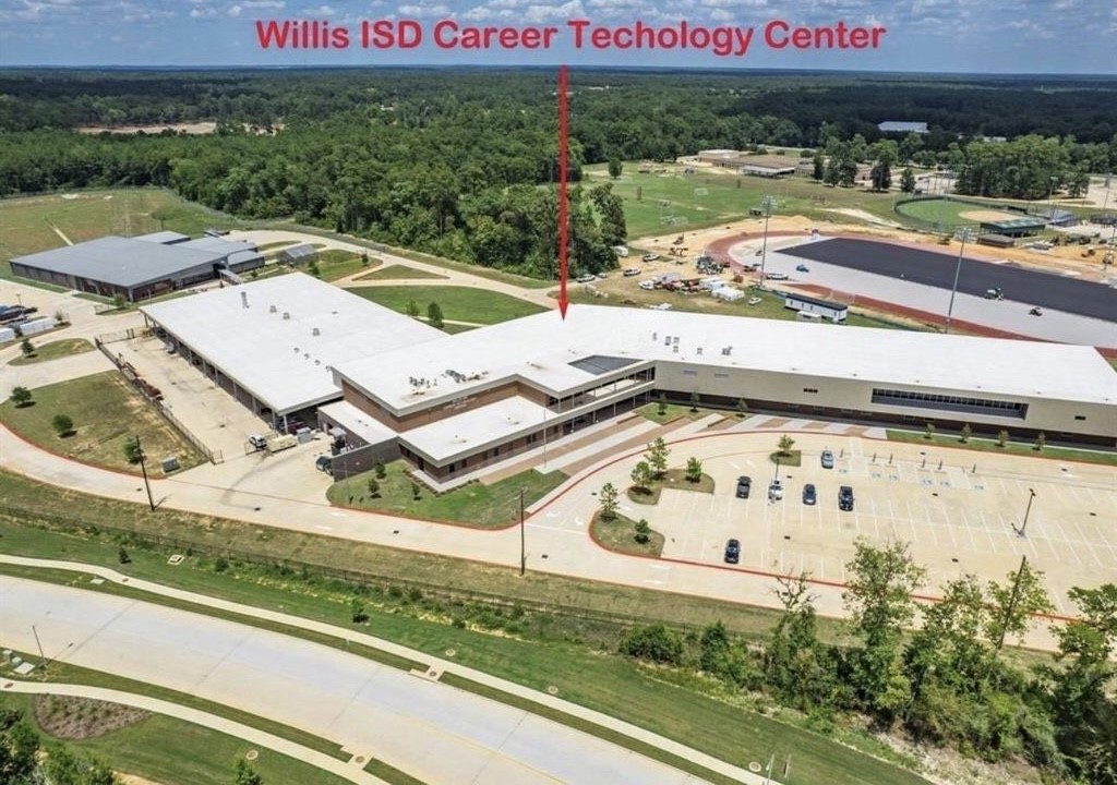 248 Seven Pines Willis, TX 77378 - Photo 14 of 17 an aerial view of a house with garden