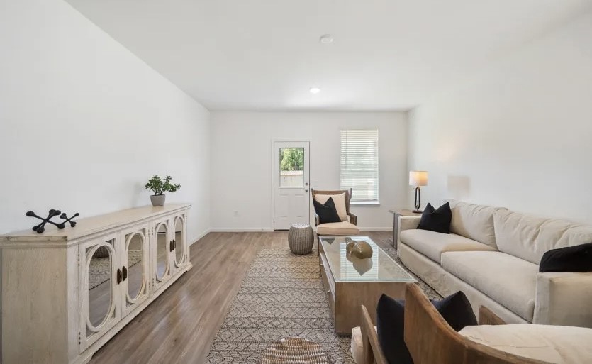 248 Seven Pines Willis, TX 77378 - Photo 5 of 17 a living room with furniture and a window