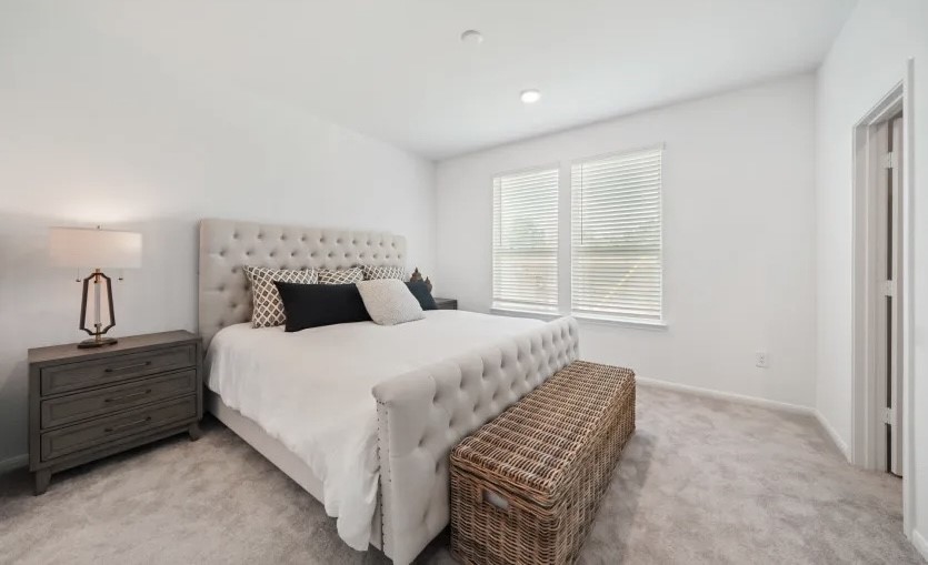 248 Seven Pines Willis, TX 77378 - Photo 6 of 17 a bedroom with a bed and window