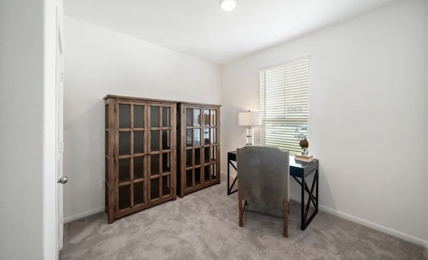 248 Seven Pines Willis, TX 77378 - Photo 8 of 17 a view of a room with furniture and windows